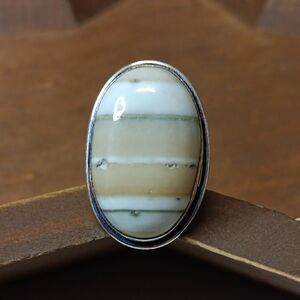 Elegant Silver and Cream Striped Ring